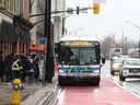 New two-way bus traffic on one-way street confounds drivers