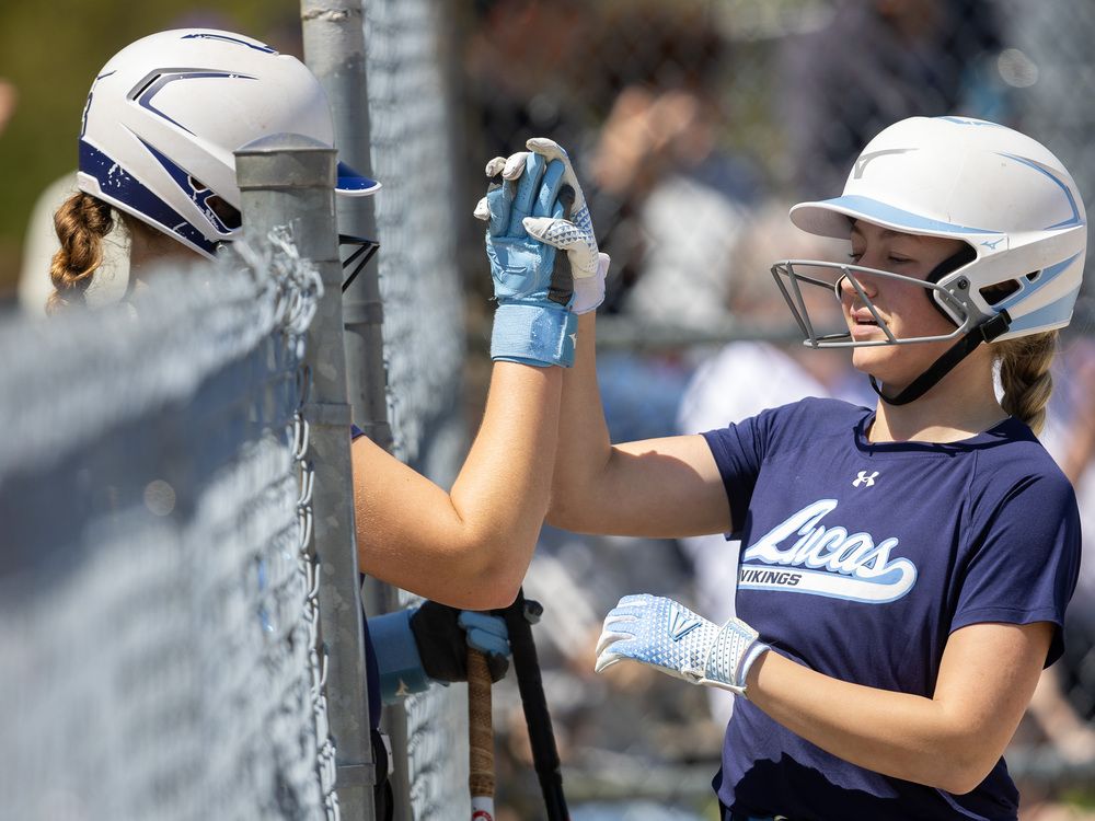 PHOTOS: Lucas vs. Aquinas, high school girls fastball