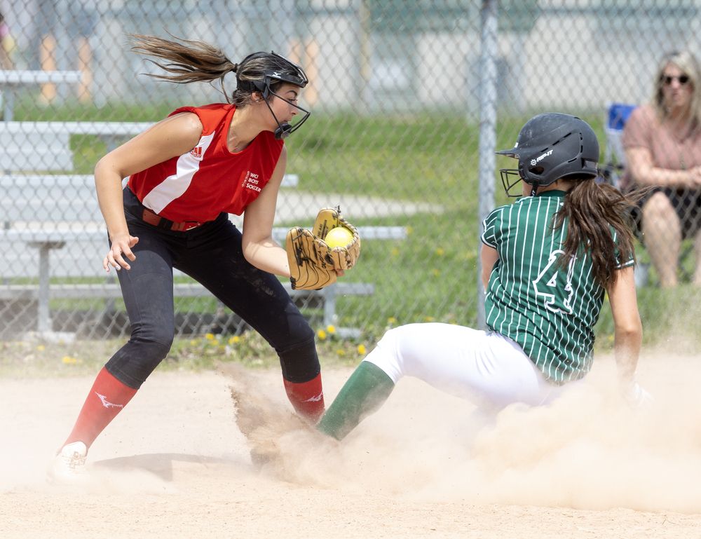 PHOTOS: Mother Teresa vs. Woodstock CI, high school girls fastball