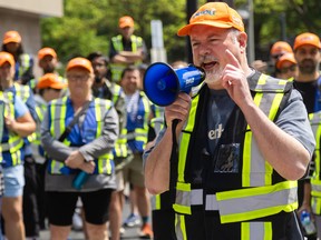 Striking WSIB workers rally in London to back contract demands