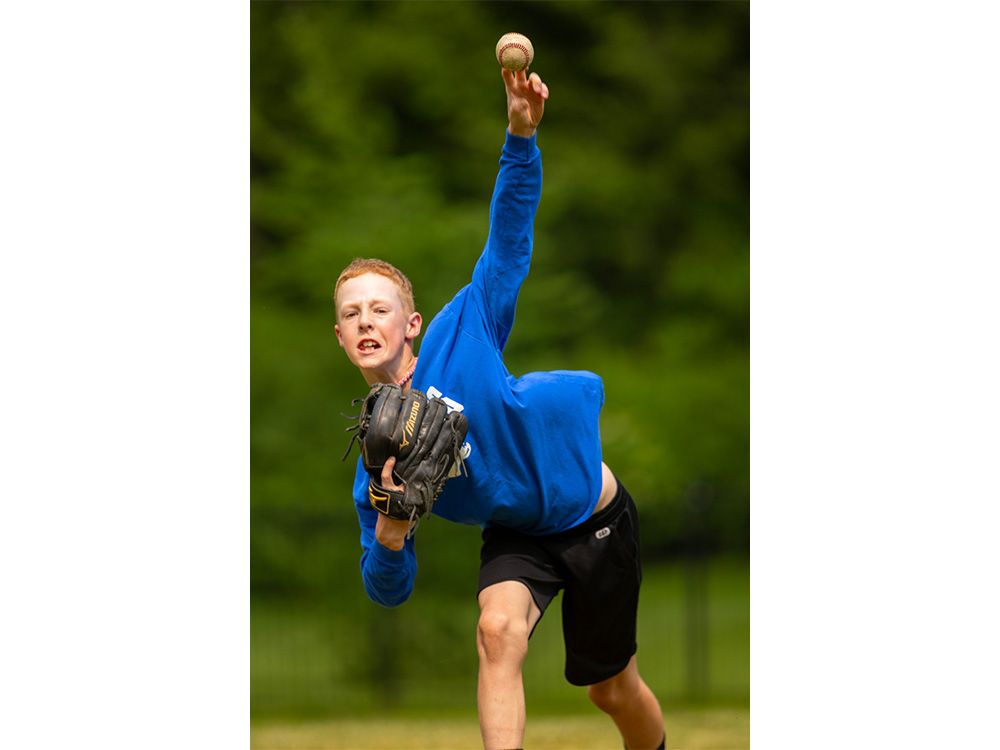 What an arm! Young hurler shatters school board division’s softball toss record