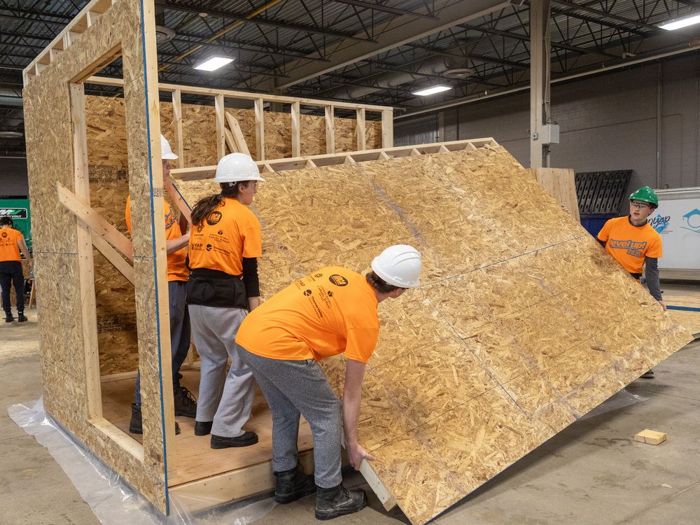 Hands-on help: High school students build shelters for London’s homeless