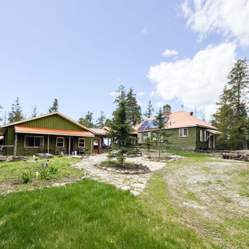 This Lake Manitou cottage property has 3 bunkies and 2,300 feet of shoreline