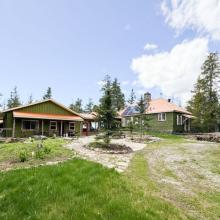 This Lake Manitou cottage property has 3 bunkies and 2,300 feet of shoreline