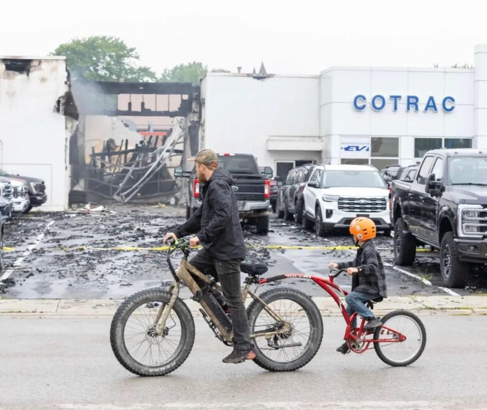PHOTOS: Fire destroys car dealership in downtown Dutton PHOTOS: Fire destroys car dealership in downtown Dutton